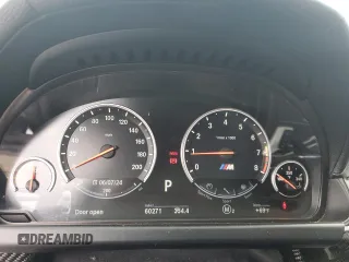 2015 BMW M6 z VIN WBSLX9C57FD160701, wystawiony jako Copart lot #57118924 z przebiegiem 60 271 mil mil oraz Tytuł czysty. Historia ofert i sprzedaży dostępna na DreamBid. Obrazek 9.