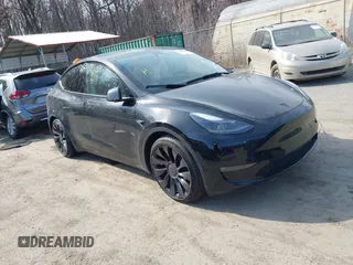2023 Tesla Model Y Performance z VIN 7SAYGDEF5PF795483, wystawiony jako IAAI lot #41784928 z przebiegiem 21 260 mil mil oraz . Historia ofert i sprzedaży dostępna na DreamBid. Obrazek 1.