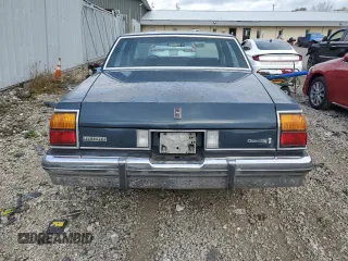 1985 Oldsmobile Delta Royale z VIN 1G3BN69YXF9080322, wystawiony jako Copart lot #78670094 z przebiegiem 58 231 mil mil oraz Tytuł czysty. Historia ofert i sprzedaży dostępna na DreamBid. Obrazek 6.