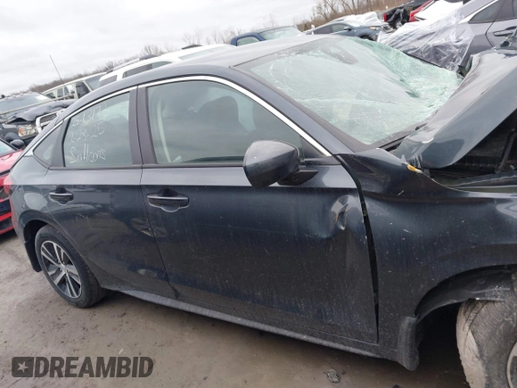 2024 Honda Civic LX z VIN 19XFL2H5XRE023870, wystawiony jako IAAI lot #41776260 z przebiegiem Nie podano mil oraz . Historia ofert i sprzedaży dostępna na DreamBid. Obrazek 12.