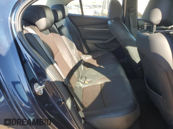 2019 Mazda 3 Premium with VIN 3MZBPAEM2KM104699, listed as a Copart auction lot 86170374 with 59,618 mi miles and Salvage Title. Bid and sale history available at DreamBid. Image 10.