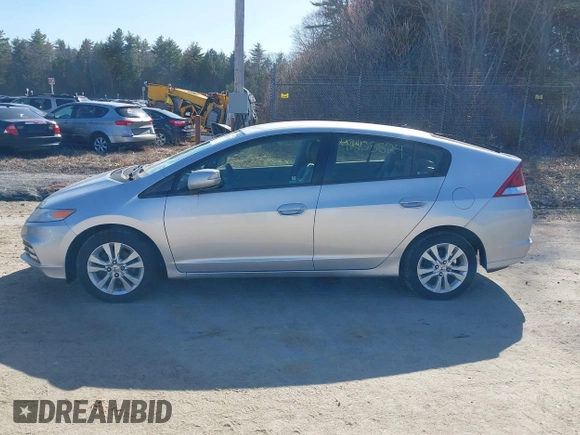2013 Honda Insight EX z VIN JHMZE2H70DS005200, wystawiony jako IAAI lot #42105624 z przebiegiem 108 949 mil mil oraz . Historia ofert i sprzedaży dostępna na DreamBid. Obrazek 12.