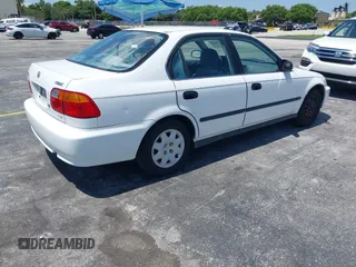 2000 Honda Civic LX z VIN 1HGEJ6679YL019958, wystawiony jako IAAI lot #42328269 z przebiegiem 217 961 mil mil oraz . Historia ofert i sprzedaży dostępna na DreamBid. Obrazek 4.