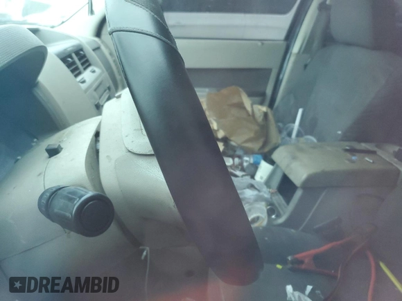 2009 Ford Escape Hybrid with VIN 1FMCU493X9KC01844, listed as a Copart auction lot 58220035 with Not provided miles and Salvage title. Bid and sale history available at DreamBid. Image 9.