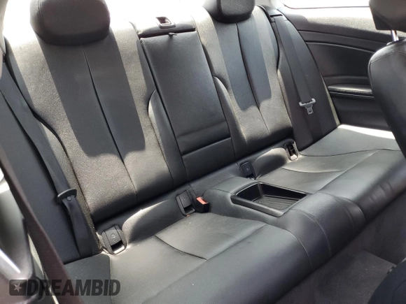 2014 BMW 4 Series 428i xDrive z VIN WBA3N9C56EF722472, wystawiony jako Copart lot #59873185 z przebiegiem 129 926 mil mil oraz Szkoda całkowita • Salvage title. Historia ofert i sprzedaży dostępna na DreamBid. Obrazek 10.