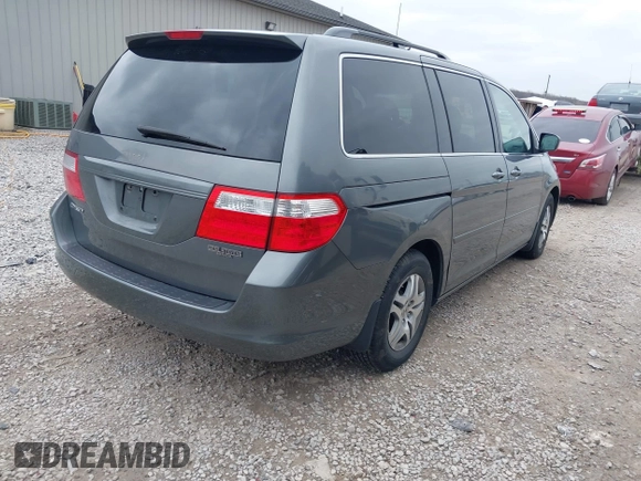 2007 Honda Odyssey EX-L with VIN 5FNRL38627B413638, listed as a IAAI auction lot 41960963 with 172,968 mi miles and . Bid and sale history available at DreamBid. Image 4.