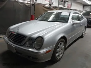 2001 Mercedes-Benz CLK-Class with VIN WDBLJ65GX1T091389, listed as a IAAI auction lot 42058375 with 215,750 mi miles. Bid and sale history available at carsss.com. Image 2.