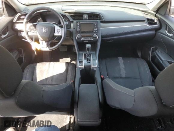 2020 Honda Civic LX z VIN 19XFC2F6XLE209685, wystawiony jako Copart lot #59595335 z przebiegiem Nie podano mil oraz Szkoda całkowita • Salvage title. Historia ofert i sprzedaży dostępna na DreamBid. Obrazek 8.