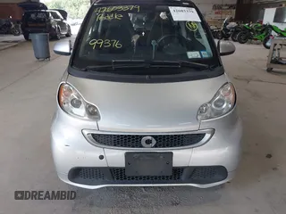 2014 Smart fortwo Pure с VIN WMEEJ3BA3EK750807, выставлен на аукционе IAAI как лот 42603379 с пробегом 99 376 миль миль и . История ставок и продаж доступна на DreamBid. Изображение 6.
