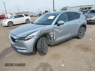 2017 Mazda CX-5 Grand Touring with VIN JM3KFBDL8H0227348, listed as a IAAI auction lot 41572377 with 124,908 mi miles. Bid and sale history available at carsss.com. Image 17.