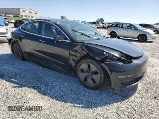 2018 Tesla Model 3 Long Range Battery with VIN 5YJ3E1EA6JF075813, listed as a Copart auction lot 52316125 with 101,460 mi miles and Salvage Title. Bid and sale history available at DreamBid. Image 4.