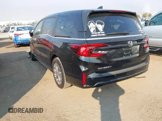 2025 Honda Odyssey Touring with VIN 5FNRL6H81SB011122, listed as a IAAI auction lot 41402170 with 2,968 mi miles and . Bid and sale history available at DreamBid. Image 3.