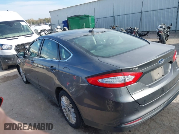 2015 Ford Fusion SE Hybrid with VIN 3FA6P0LUXFR266743, listed as a IAAI auction lot 40862039 with 116,610 mi miles. Bid and sale history available at carsss.com. Image 14.
