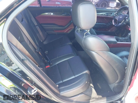 2015 Cadillac CTS Premium AWD with VIN 1G6AZ5S35F0129572, listed as a IAAI auction lot 42045670 with 62,758 mi miles and . Bid and sale history available at DreamBid. Image 8.