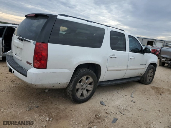 2007 GMC Yukon XL SLE with VIN 1GKFC16J87J300661, listed as a Copart auction lot 89305215 with 194,424 mi miles and Salvage Title. Bid and sale history available at carsss.com. Image 3.
