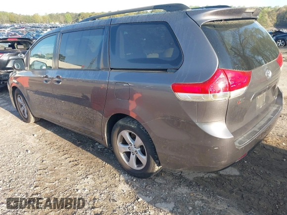 2011 Toyota Sienna LE AAS with VIN 5TDKK3DC9BS100414, listed as a IAAI auction lot 41901835 with 186,634 mi miles and . Bid and sale history available at DreamBid. Image 3.