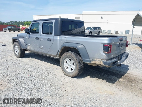 2020 Jeep Gladiator Sport S with VIN 1C6HJTAG7LL128940, listed as a IAAI auction lot 42108154 with 90,596 mi miles and . Bid and sale history available at DreamBid. Image 3.