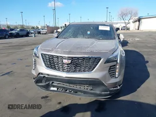 2023 Cadillac XT4 FWD Luxury z VIN 1GYAZAR40PF135132, wystawiony jako IAAI lot #41684609 z przebiegiem 12 164 mil mil oraz . Historia ofert i sprzedaży dostępna na DreamBid. Obrazek 13.