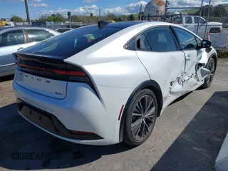 2023 Toyota Prius LE with VIN JTDACAAUXP3012538, listed as a IAAI auction lot 41948103 with 33,338 mi miles and . Bid and sale history available at DreamBid. Image 4.