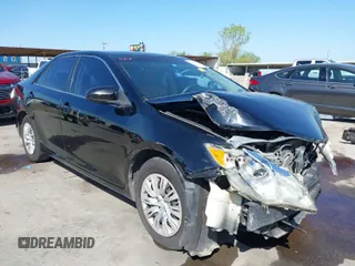 2013 Toyota Camry L with VIN 4T4BF1FK1DR308848, listed as a IAAI auction lot 42014028 with 192,645 mi miles. Bid and sale history available at carsss.com. Image 1.