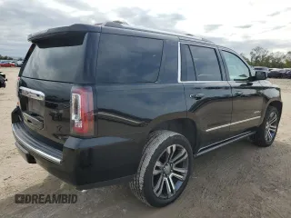 2018 GMC Yukon Denali with VIN 1GKS1CKJ8JR201028, listed as a Copart auction lot 83478394 with 133,302 mi miles and Salvage Title. Bid and sale history available at carsss.com. Image 3.