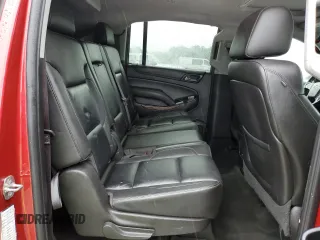 2015 Chevrolet Suburban LT with VIN 1GNSCJKC2FR306223, listed as a Copart auction lot 58733475 with 191,330 mi miles and Salvage title. Bid and sale history available at DreamBid. Image 11.
