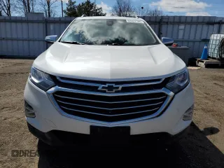 2021 Chevrolet Equinox Premier z VIN 2GNAXXEV6M6137669, wystawiony jako Copart lot #53437745 z przebiegiem 93 812 mil mil oraz Szkoda całkowita • Salvage title. Historia ofert i sprzedaży dostępna na DreamBid. Obrazek 5.