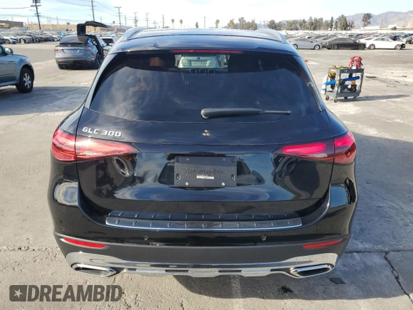 2023 Mercedes-Benz GLC with VIN W1NKM4GB4PU017214, listed as a Copart auction lot 87627235 with 8,678 mi miles and Salvage Title. Bid and sale history available at carsss.com. Image 6.