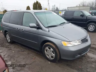 1999 Honda Odyssey EX z VIN 2HKRL1862XH550360, wystawiony jako IAAI lot #41442749 z przebiegiem 136 226 mil mil oraz . Historia ofert i sprzedaży dostępna na DreamBid. Obrazek 1.