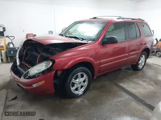 2003 Oldsmobile Bravada with VIN 1GHDT13S532193681, listed as a IAAI auction lot 41509563 with 162937 miles. Bid and sale history available at carsss.com. Image 18.