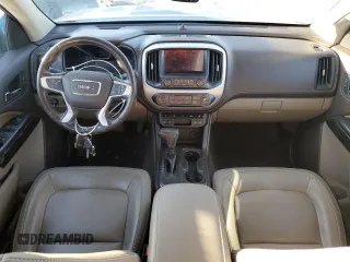 2018 GMC Canyon 4WD SLT z VIN 1GTG6DEN4J1244187, wystawiony jako Copart lot #89218245 z przebiegiem 105 991 mil mil oraz Szkoda całkowita • Salvage title. Historia ofert i sprzedaży dostępna na DreamBid. Obrazek 8.