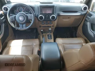 2012 Jeep Wrangler Unlimited Sahara z VIN 1C4HJWEG6CL141988, wystawiony jako Copart lot #61631115 z przebiegiem 140 401 mil mil oraz Szkoda całkowita • Salvage title. Historia ofert i sprzedaży dostępna na DreamBid. Obrazek 8.