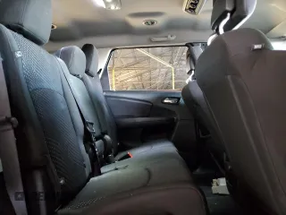 2019 Dodge Journey SE z VIN 3C4PDCBG0KT874921, wystawiony jako Copart lot #43580735 z przebiegiem 88 276 mil mil oraz Szkoda całkowita • Salvage title. Historia ofert i sprzedaży dostępna na DreamBid. Obrazek 11.