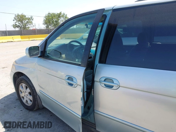 2003 Honda Odyssey EX with VIN 2HKRL18633H502246, listed as a IAAI auction lot 42414427 with 251,759 mi miles and . Bid and sale history available at DreamBid. Image 12.
