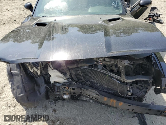 2012 Dodge Challenger SXT Plus z VIN 2C3CDYAGXCH127824, wystawiony jako Copart lot #55026435 z przebiegiem Nie podano mil oraz Szkoda całkowita • Salvage title. Historia ofert i sprzedaży dostępna na DreamBid. Obrazek 11.