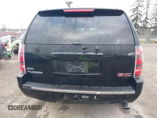 2011 GMC Yukon Denali with VIN 1GKS2EEF9BR261336, listed as a IAAI auction lot 41796533 with 149,808 mi miles. Bid and sale history available at carsss.com. Image 16.