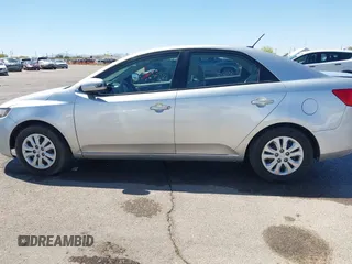2010 Kia Forte EX with VIN KNAFU4A29A5195670, listed as a IAAI auction lot 42075961 with 160,648 mi miles. Bid and sale history available at carsss.com. Image 14.