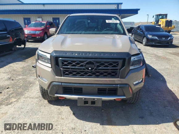 2024 Nissan Frontier Pro-4X with VIN 1N6ED1EK7RN610467, listed as a Copart auction lot 50138015 with 24,723 mi miles and Salvage title. Bid and sale history available at DreamBid. Image 5.