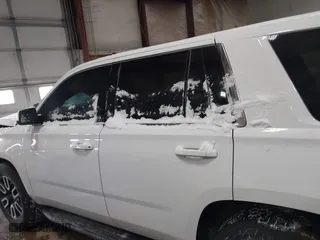 2015 Chevrolet Tahoe Commercial with VIN 1GNSK2EC8FR722684, listed as a IAAI auction lot 41553558 with 119,434 mi miles. Bid and sale history available at carsss.com. Image 14.