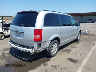 2010 Chrysler Town & Country Touring with VIN 2A4RR5D11AR346489, listed as a IAAI auction lot 42102358 with 150,860 mi miles. Bid and sale history available at carsss.com. Image 4.