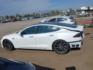 2018 Tesla Model S 75D с VIN 5YJSA1E27JF241451, выставлен на аукционе IAAI как лот 42374353 с пробегом 76 543 миль миль и . История ставок и продаж доступна на DreamBid. Изображение 15.
