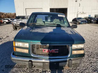 1995 GMC Sierra 1500 z VIN 2GTEK19K6S1580355, wystawiony jako Copart lot #87416254 z przebiegiem 162 829 mil mil oraz Szkody całkowita. Historia ofert i sprzedaży dostępna na DreamBid. Obrazek 5.