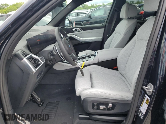 2024 BMW X5 M60i with VIN 5UX33EU08R9W18668, listed as a Copart auction lot 51631284 with 875 mi miles and Salvage Title. Bid and sale history available at carsss.com. Image 7.