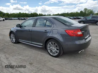 2012 Suzuki Kizashi SLS Sport z VIN JS2RF9A8XC6100015, wystawiony jako Copart lot #56905645 z przebiegiem 128 440 mil mil oraz Szkody całkowita. Historia ofert i sprzedaży dostępna na DreamBid. Obrazek 2.