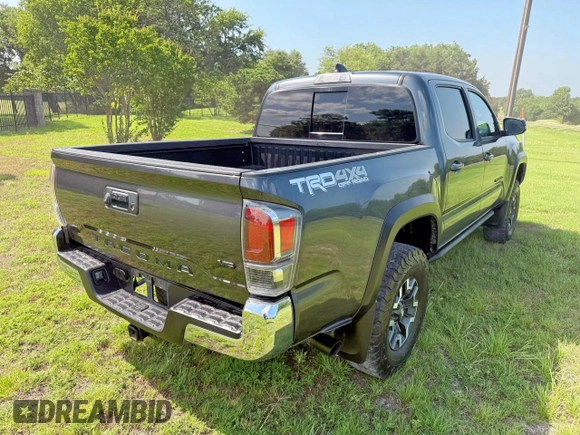 2021 Toyota Tacoma SR с VIN 3TMCZ5AN3MM441215, выставлен на аукционе Copart как лот 64744385 с пробегом 30 503 миль миль и Списание • Salvage title. История ставок и продаж доступна на DreamBid. Изображение 4.