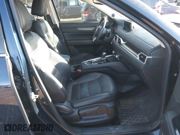 2017 Mazda CX-5 Grand Touring with VIN JM3KFBDL0H0104806, listed as a IAAI auction lot 41621964 with 60,728 mi miles. Bid and sale history available at carsss.com. Image 5.