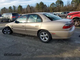 1998 Cadillac Catera z VIN W06VR52R5WR014681, wystawiony jako Copart lot #44159985 z przebiegiem 90 059 mil mil oraz Szkoda całkowita • Salvage title. Historia ofert i sprzedaży dostępna na DreamBid. Obrazek 2.