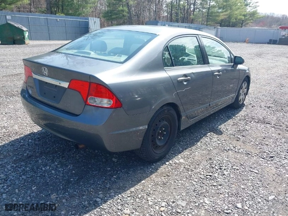 2010 Honda Civic Sdn LX with VIN 2HGFA1F51AH304467, listed as a IAAI auction lot 42042593 with 200,100 mi miles. Bid and sale history available at carsss.com. Image 4.