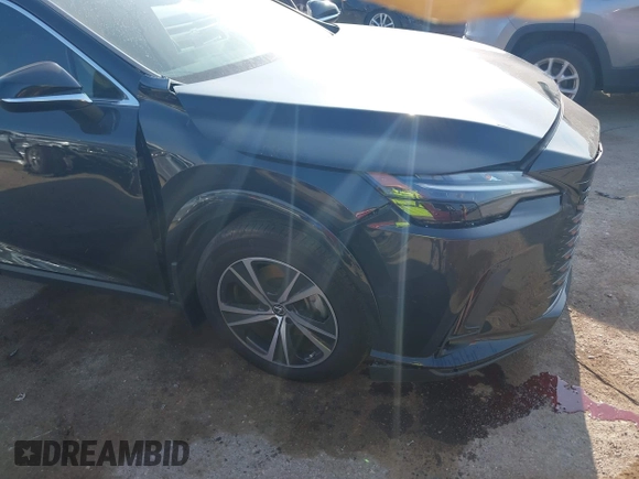 2024 Lexus RX 350 with VIN 2T2BAMBA3RC039795, listed as a IAAI auction lot 42324555 with 19,061 mi miles and . Bid and sale history available at DreamBid. Image 6.