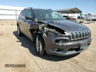 2015 Jeep Cherokee Latitude z VIN 1C4PJMCB2FW734385, wystawiony jako Copart lot #57333805 z przebiegiem 121 249 mil mil oraz Szkoda całkowita • Salvage title. Historia ofert i sprzedaży dostępna na DreamBid. Obrazek 14.